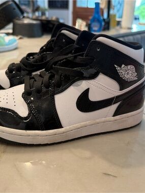 Jordan Black and White High Top Sneakers